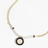 12460209-26BA-D5F5-F2A7-6BCC5CA62197.jpg Black and white medallion double C necklace