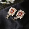 14740B20-31D6-484F-00B7-A704C0DC7659.jpg CC Earrings 0017