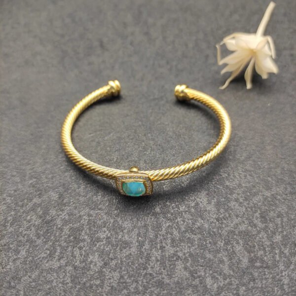 21708590-A77A-5780-D777-49EBD8B7673A.jpg Cable Classics Bracelet with Blue Topaz and Diamonds 18K Yellow Gold 4mm