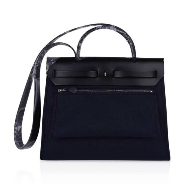 2A10B7EC-B4A2-AA28-9DE5-163E8877F748.jpg Herbag Zip Navy on Black 31 Militaire Canvas / Vache Hunter Leather