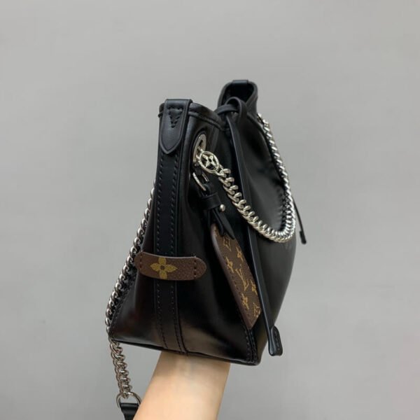 2E7E6E30-53E2-17EC-BE9F-2100BBEA964E.jpg Louis Vuitton CarryAll Vibe BB M12888