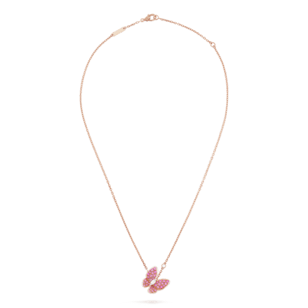 338C6A6A-1000-2847-F155-560E53F8EF95.png Two Butterfly pendant