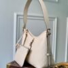 341DE474-DD5A-51D1-A2A5-EC2C85FD1679.jpg Louis Vuitton M46293 CarryAll PM