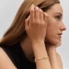 4AE712B8-51BD-5F2A-DA90-2A6E0ADD6D3F.jpg IDYLLE BLOSSOM MONOGRAM BRACELET, YELLOW GOLD AND DIAMONDS