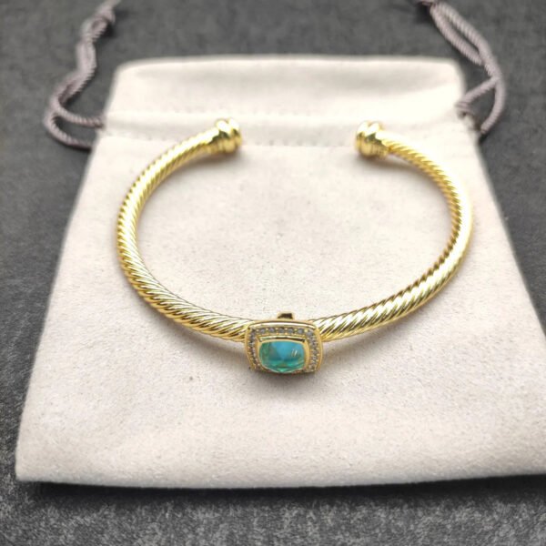 4F8228F9-1B85-446D-6BD1-9D8F69D39D19.jpg Cable Classics Bracelet with Blue Topaz and Diamonds 18K Yellow Gold 4mm