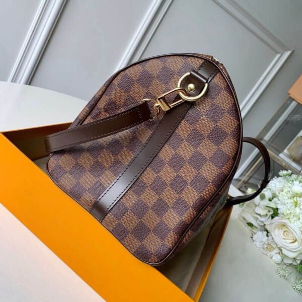 5B38AF12-79FB-30FF-9704-3D0021306403.jpg Louis Vuitton Speedy Bandoulière 30 N40590