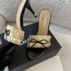 Chanel Off-white Ruffled Fabric CC Bow Slide Sandals