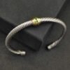 6CD1E599-635E-53F8-BFDD-CEE4C23F6E06.jpg David Yurman 5mm 18k Gold and Sterling Silver Diamond Station Cable Bracelet