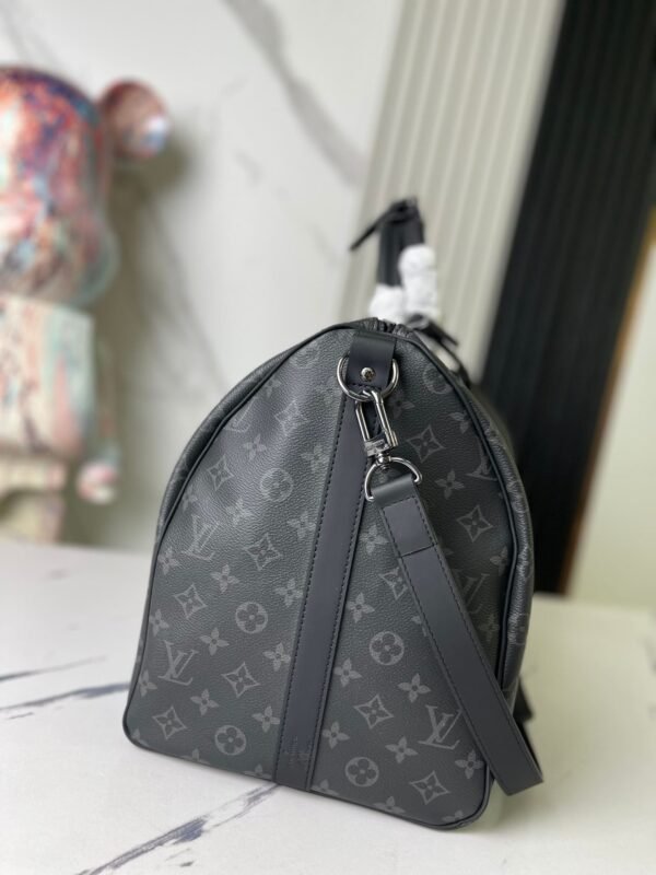 744D3D46-8103-C92F-86CB-FA985143977A.jpg Louis Vuitton M40605 Keepall Bandoulière 55