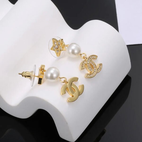 7C27F33A-2599-8AD2-D3C6-63C61B221845.jpg CC Earrings 0019