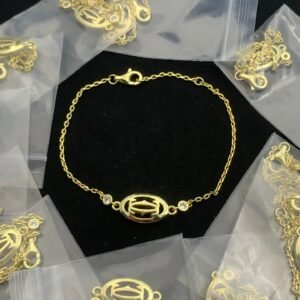 DOUBLE C DE CARTIER LOGO BRACELET - 18CT GOLD