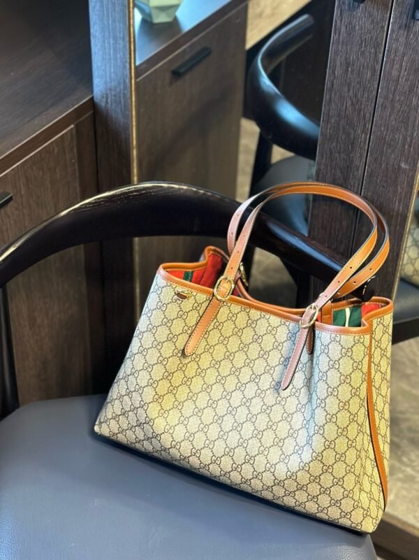 AA1082C3-6677-F197-BFFE-9C7DF41EE3CE.jpg GUCCI GG Emblem medium tote bag