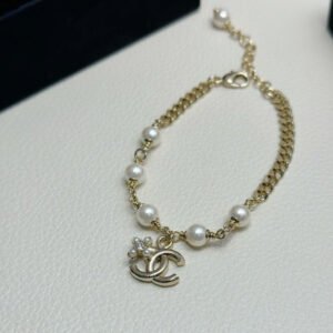 Double row pearls and diamonds double C bracelet