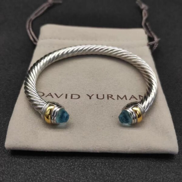 AC80A49C-0F4B-D1C8-F2F9-5B64AC5B451C.jpg Classic Cable Bracelet Sterling Silver with 14K Yellow Gold and Blue Topaz, 7mm