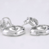 AE765202-4227-B1D2-5941-FA367C277CBB.png Love Britt G Heart Earrings in Silver