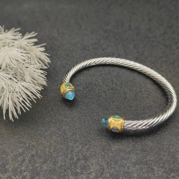 Renaissance&reg; Classic Cable Bracelet Sterling Silver with 14K Yellow Gold, Blue Topaz, 5mm