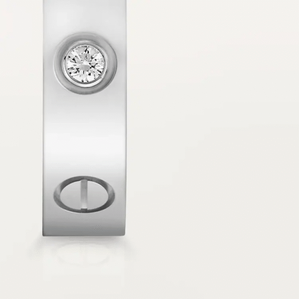 D5056445-BFD0-9B97-8A4C-7286943AD276-1.png LOVE WEDDING BAND, 1 DIAMOND
