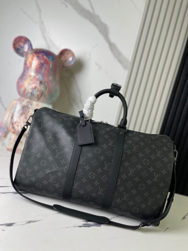 D51CA8D8-4C93-BDD0-5834-B7175A26E9DD.jpg Louis Vuitton M40605 Keepall Bandoulière 55