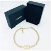 D87F11E0-29D1-F6E8-F293-C5B130CED901.jpg Authentic Heavy Gilt Necklace CC Logo set with Seed Pearls and Crystals