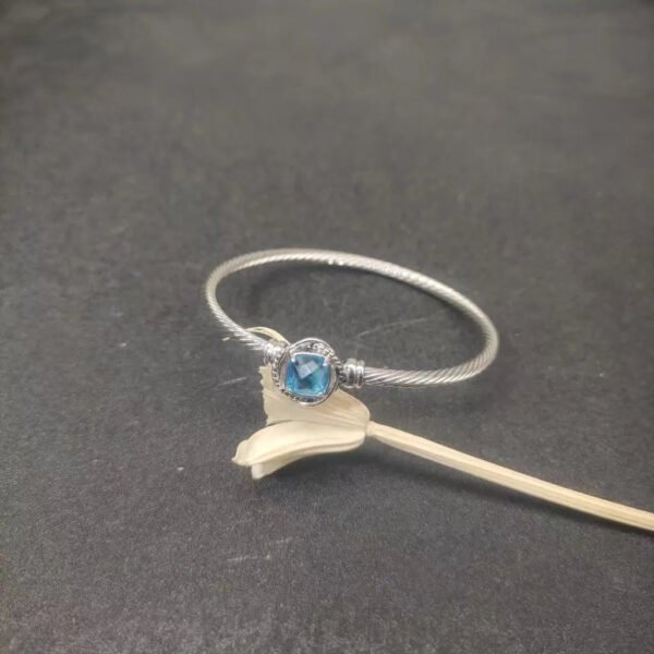 D8AE4652-E5DA-2F65-BCBA-7E53A927A791.jpg Cable Classics Bracelet,Blue Topaz and Bead Detail, Sterling Silver, 3mm - 17 CM