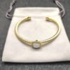 DDE75BCD-F591-6565-090A-A4E8CD5AD884.jpg Cable Classics Bracelet with White Gold Agate and Diamonds 18K Yellow Gold 4mm