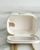 Chanel Small Gold Ball Makeup Bag