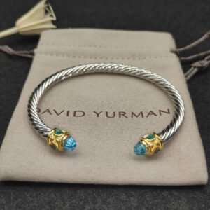 FDFE7556-2353-CE2E-C939-0544DCC0FF0F.jpg Renaissance® Classic Cable Bracelet Sterling Silver with 14K Yellow Gold, Blue Topaz, 5mm